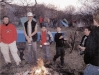 James Spencer, Austin Fielding, Brandon Sena, Adam Jones, A.J. Pagitt, and Will Wood chilling around the campfire.